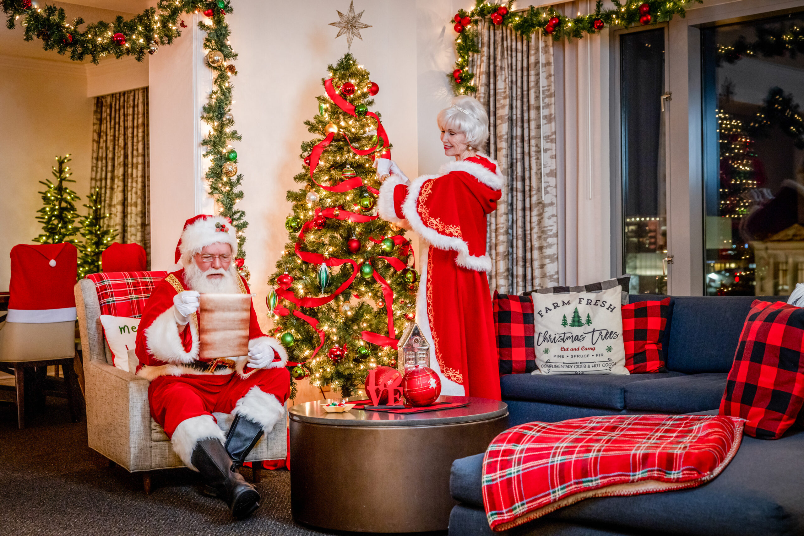 Mr. and Mrs. Claus in the Holiday Lodge living room